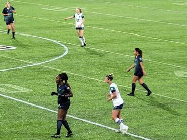 Kristelle Yewah on the field playing for MN Aurora