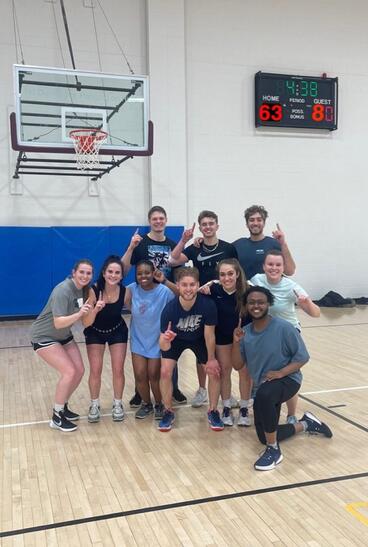 Students playing basketball