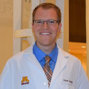 Headshot of Robert Springer in a lab coat
