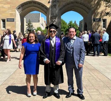 Elvis Idrovo Mejia graduating from St. Thomas