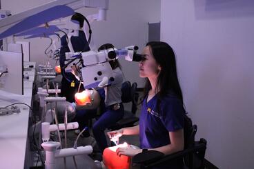 Student participates in a microscope simulation