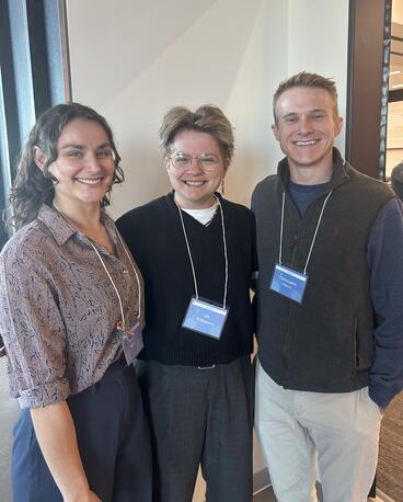 Aitken poses with fellow conference attendees
