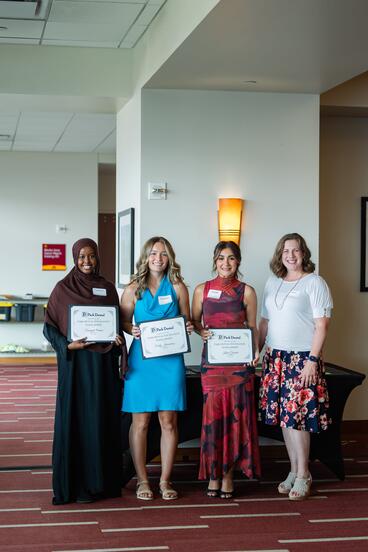 Park Dental Scholarship awardees pose with the award presenter