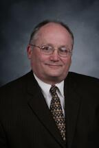 Headshot of Tom Larson