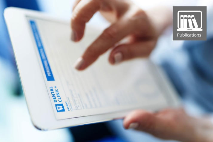 close up image of a person holding an tablet