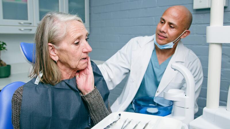 geriatric patient receiving dental care