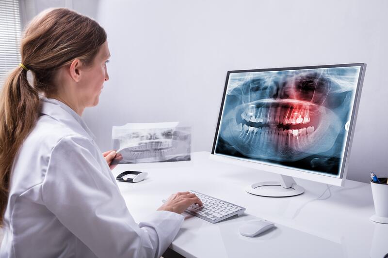 dentist reviewing complex case