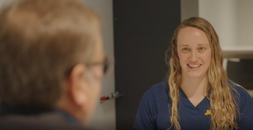 A student speaks with a donor