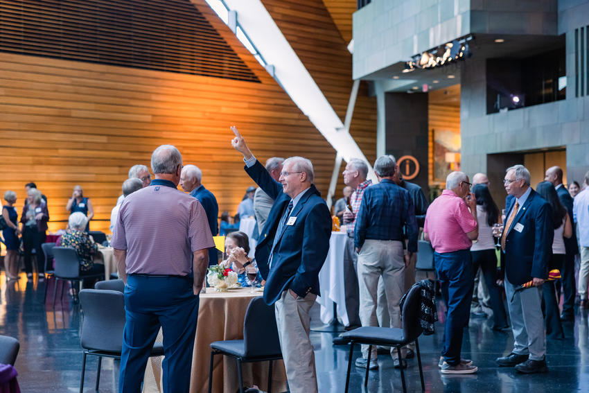 Alumni enjoy a reception at alumni weekend
