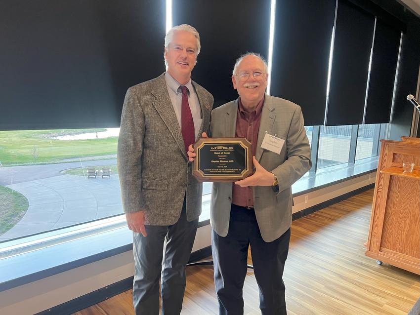 Stephen Shuman with plaque.