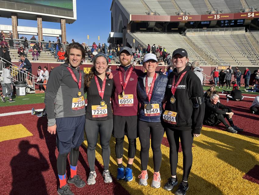 Cole Johnson with friends after a race in Huntington Bank Stadium