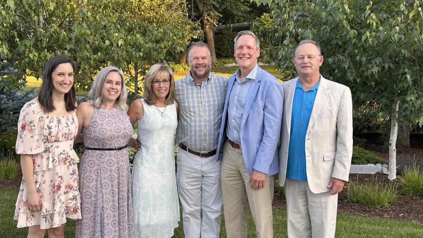 Derks and her husband with members of the Division of TMD & Orofacial Pain