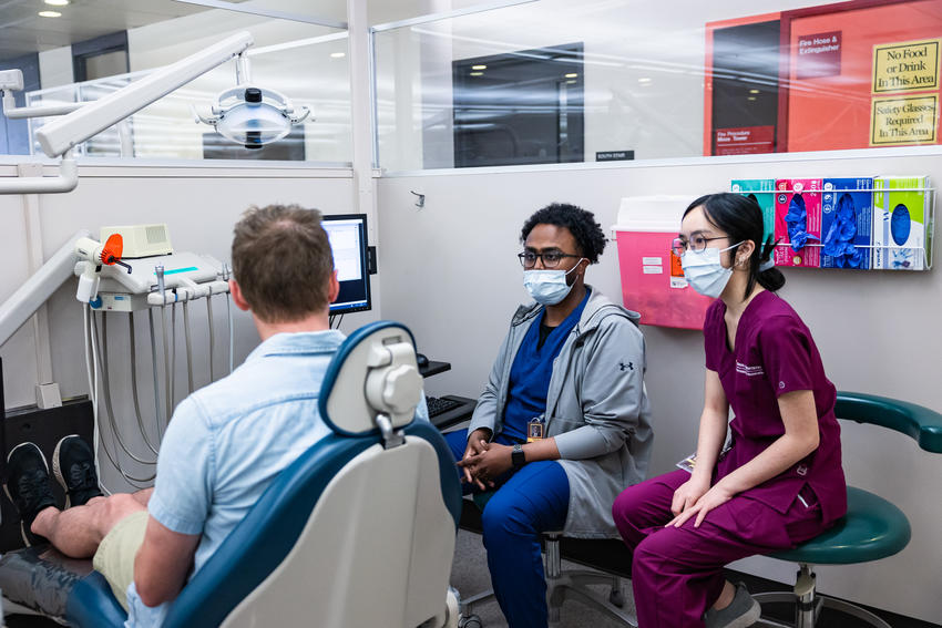 Two students with patient at TEATL Teledentistry Simulation