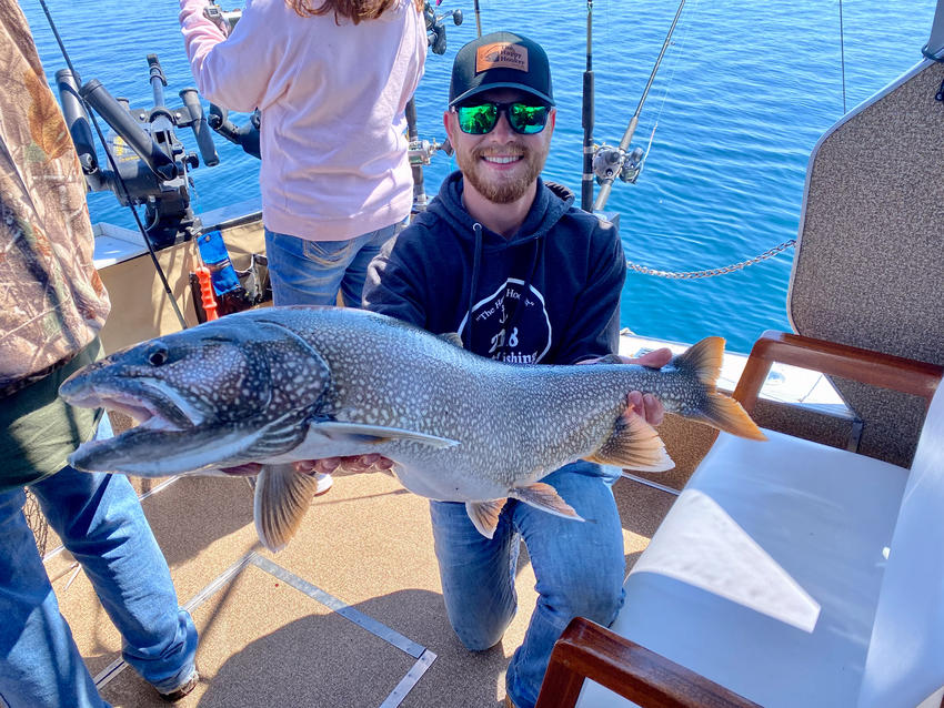 Riley Leslie with fish he caught.
