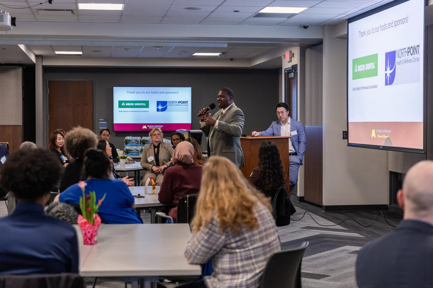 Michael Brooks addresses the audience at an AAOC event
