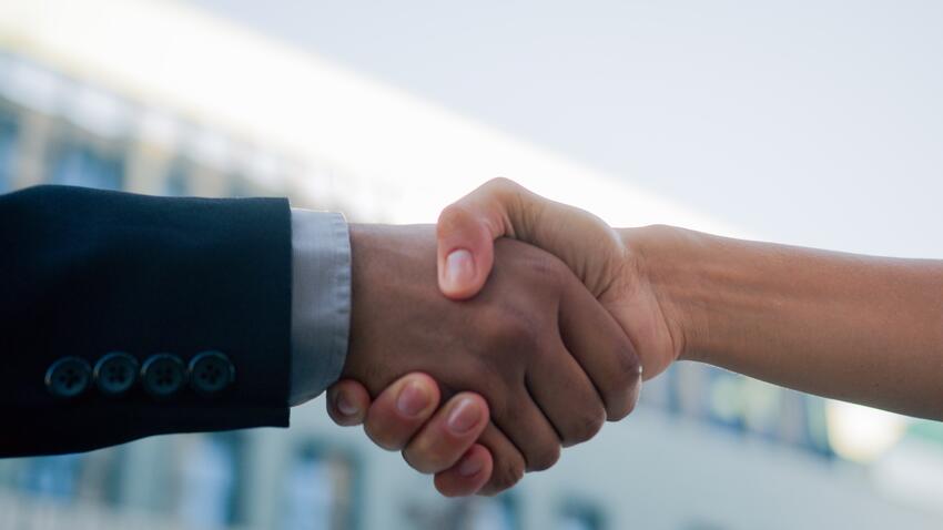 Close-up of a handshake