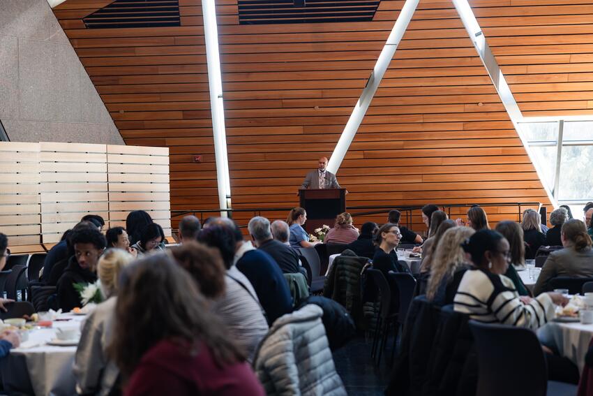 Dean Mays addresses faculty and staff at the Winter Celebration