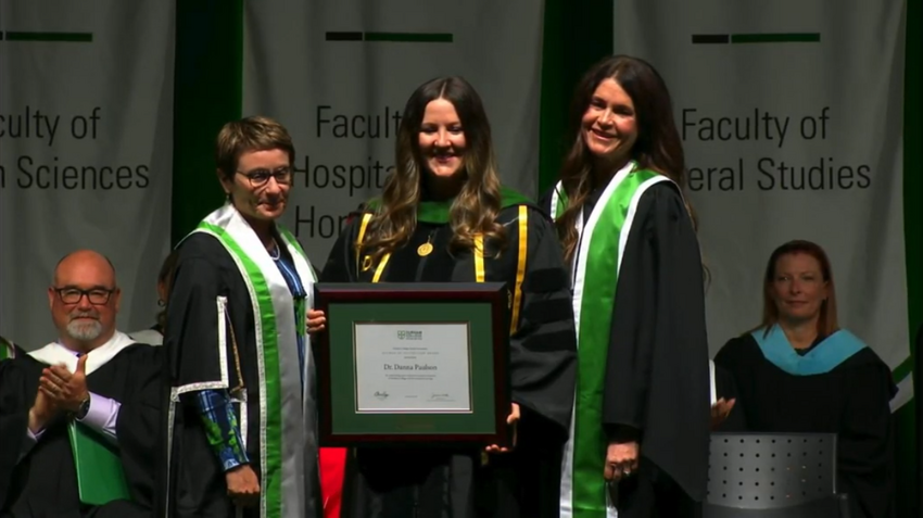 Paulson receives her award onstage