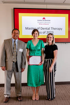 Karl Self, Rosemary Skriver, and Jenna Johnson pose with Skriver's award