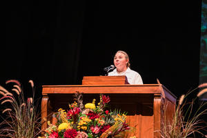 Shivan Nelson, DDS '11, speaks at the White Coat Ceremony