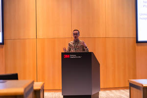 Nick Fischer speaks at the podium