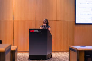 Artinger speaks at the podium