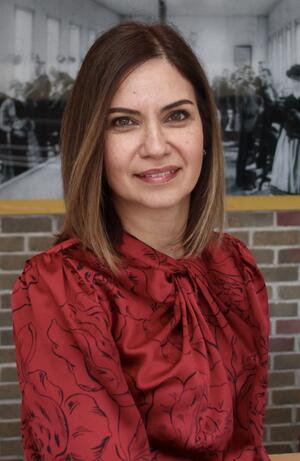 Marcia Campos in red silk blouse